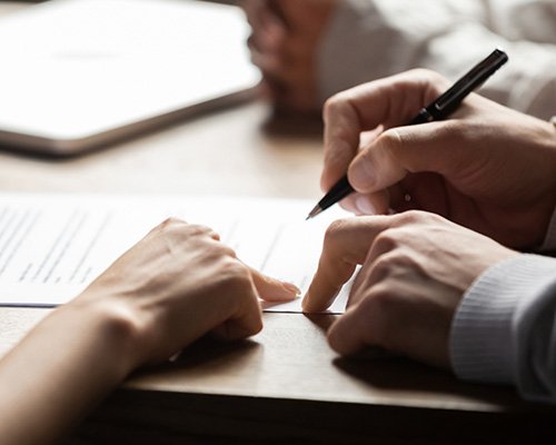 Remortgage mortgage customers signing paperwork